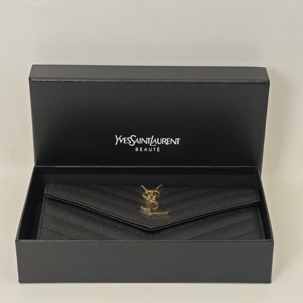 Yves Saint Laurent Quilted Black Clutch with Gold Accent